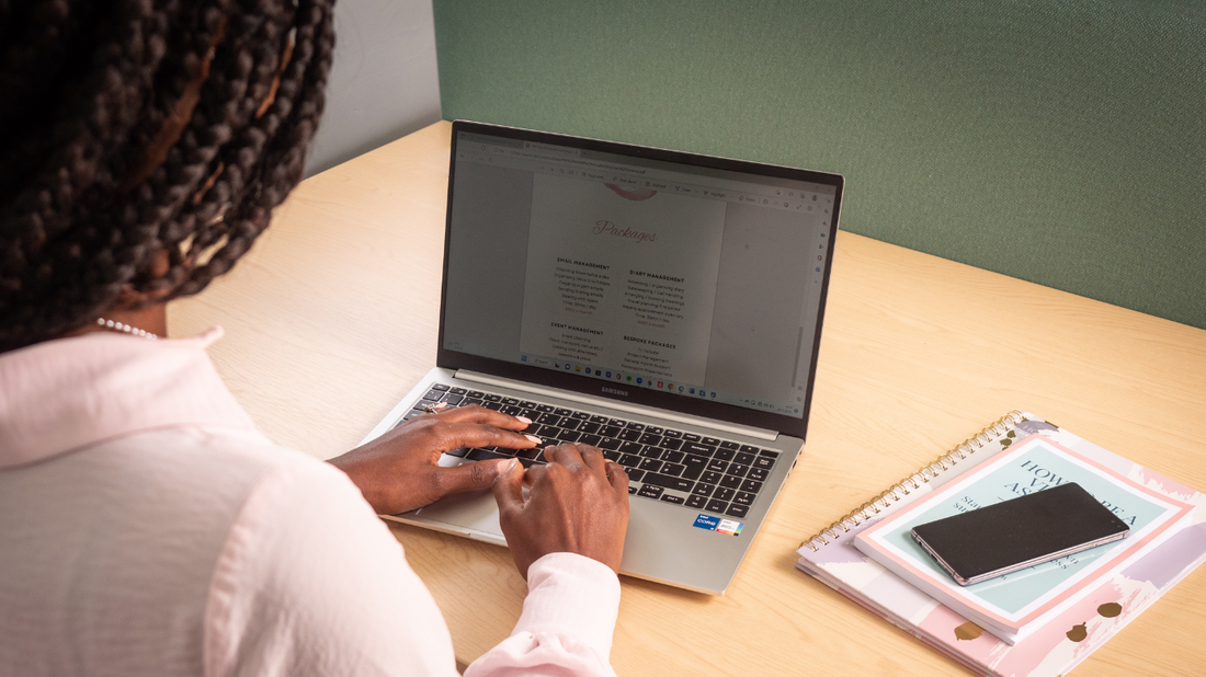 Woman working at a laptop